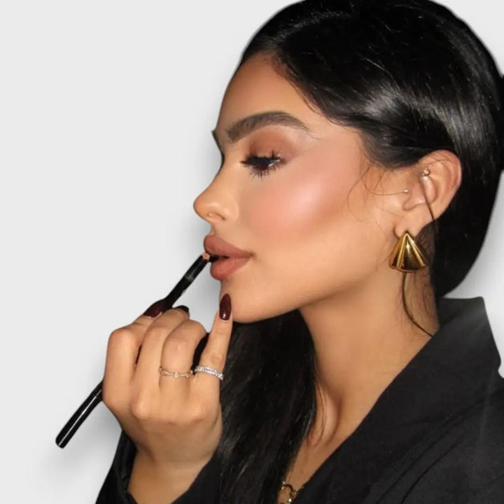 Nuna – Skulpturelle Guldøreringe